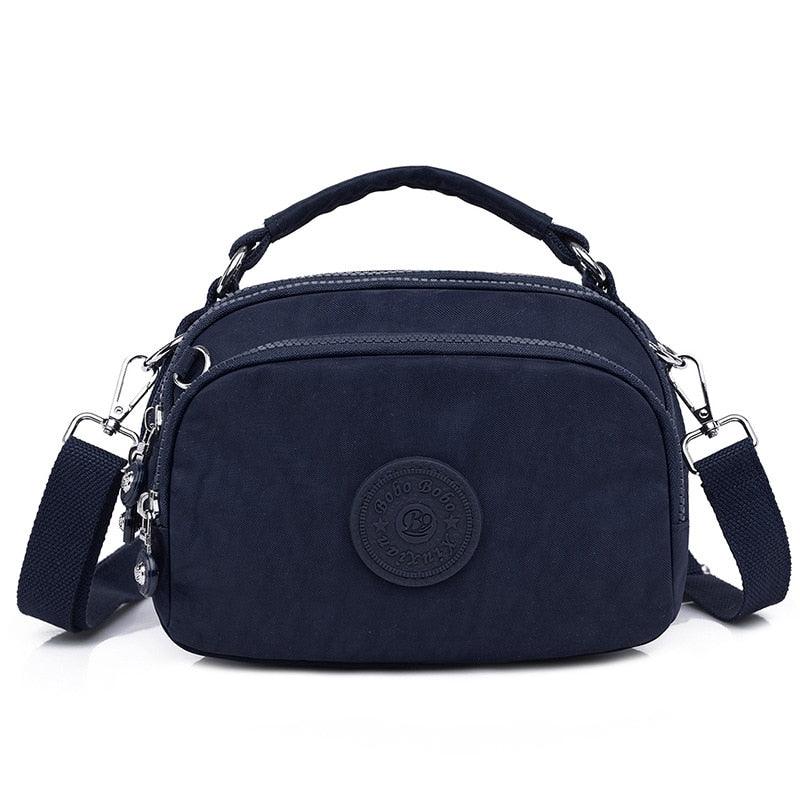 Bolsa tiracolo leve e pequena - SELETO