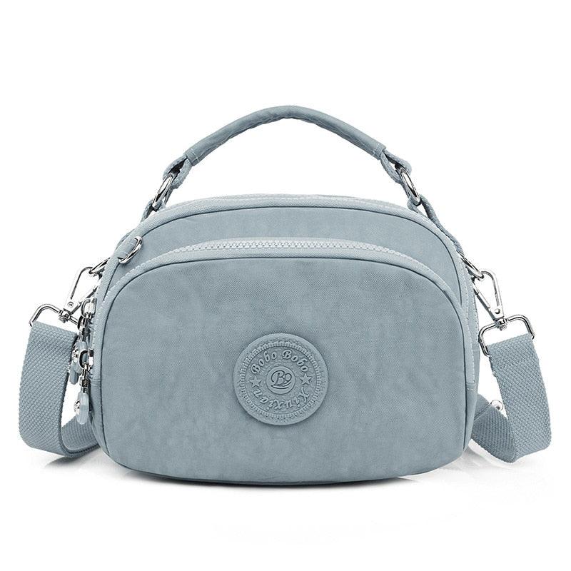 Bolsa tiracolo leve e pequena - SELETO